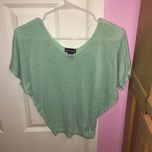 a teal blouse
